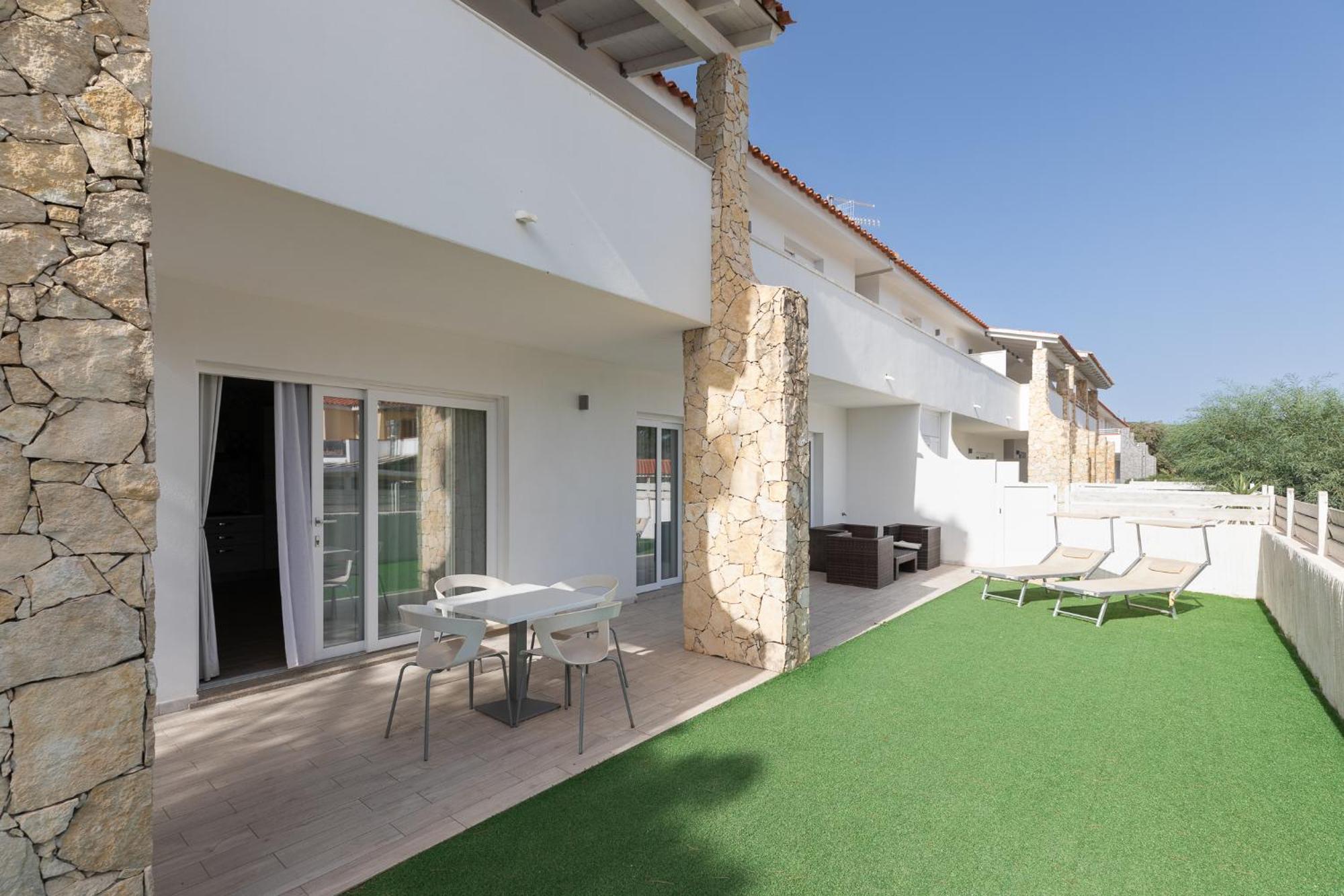 Case Vacanze "Bianco Mare" Porto Pino Exterior photo