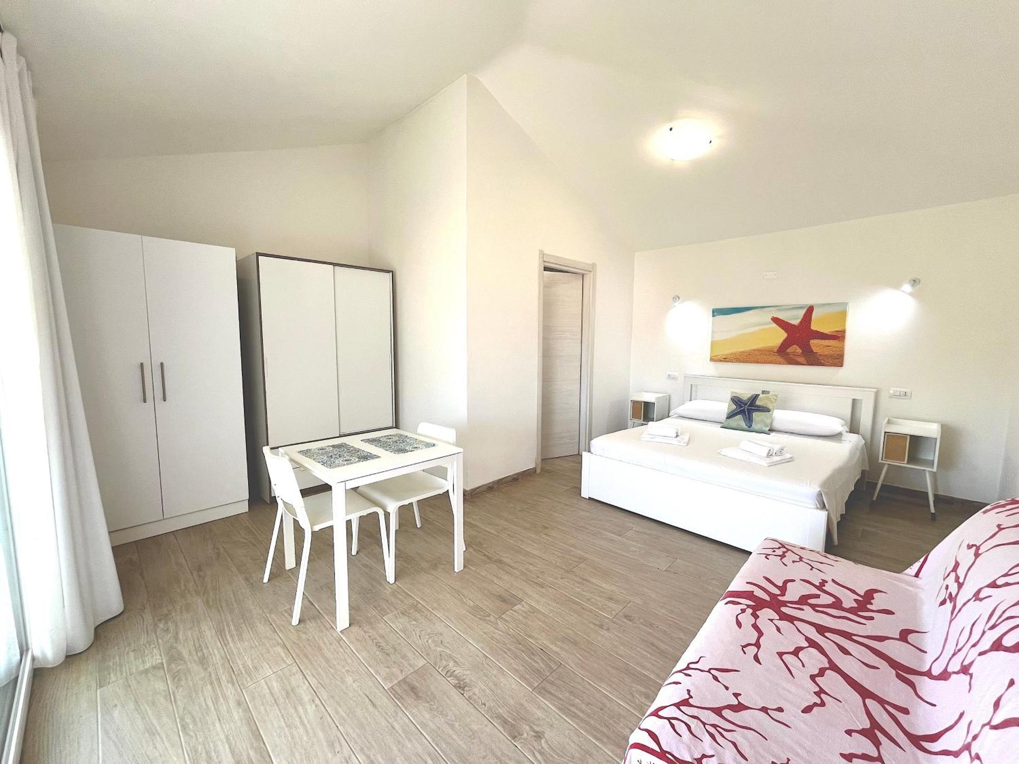 Case Vacanze "Bianco Mare" Porto Pino Exterior photo